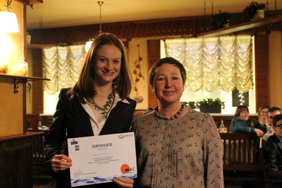 IGERT fellow Alexandra Giese receiving her Model Arctic Council certificate.