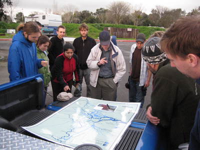 UC Davis students and faculty study a map of the Delta